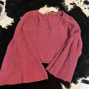 Flare arm, pink sweater